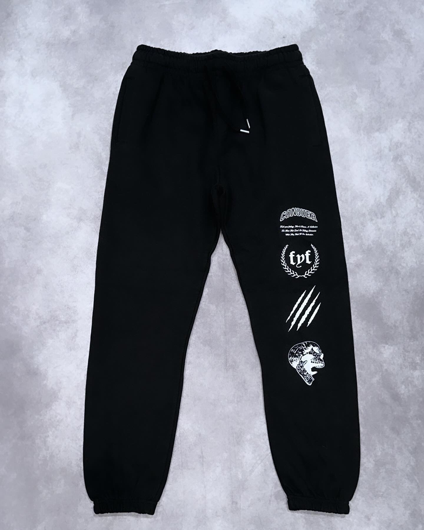 "LEAVE OUR MARK" Joggers in Black